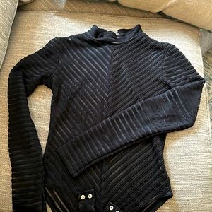 Forever 21 black sheet bodysuit with mock turtleneck and long sleeves.